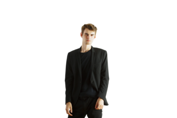 Young man in a formalblazer standing confidently, wearing a casual dark shirt. Isolated on a clean white background. Business style