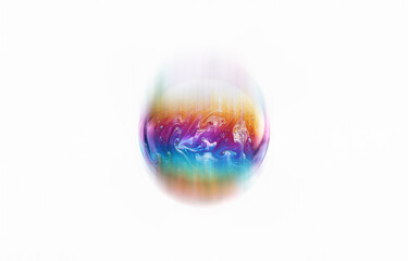 A single soap bubble with iridescent colors and tiny bubbles trapped inside.