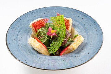  Asian Salad with Tofu and Edible Flower on a Plate Against a White Background