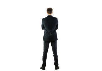 Rear view of a man in a formal suit standing with arms crossed, isolated on a white background. Professional attire concept
