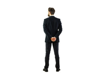 Man in formal business attire standing with hands behind back, isolated on white background. Concept of professionalism and confidence