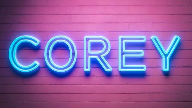 Neon sign reading name Corey illuminated against dusky pink backdrop at night
