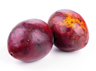 Obraz premium Two Red Mangos on White Background