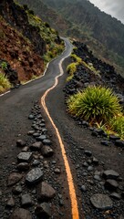 Serpentine road surrounded by volcanic rocks in Madeira.