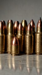 Single line drawing of bullets or ammunition.