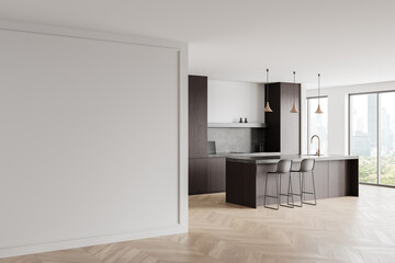 Fototapeta premium Modern kitchen interior with minimalist dark wood cabinets and island, pendant lights, large windows, and chevron wood flooring. 3D Rendering