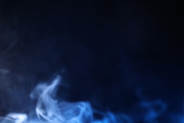 Fototapeta premium White and blue bright lines, green smoke on a dark background, colourful abstract, vibrant fog, minimalism, line of light
