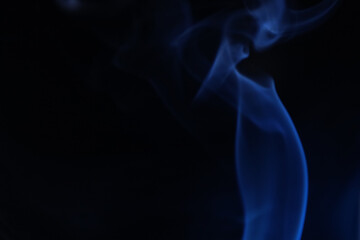 Obraz premium Navy blue coloured fog, bright lines, vibrant smoke on the dark background, colourful abstract, blue fog, minimalism, line of light