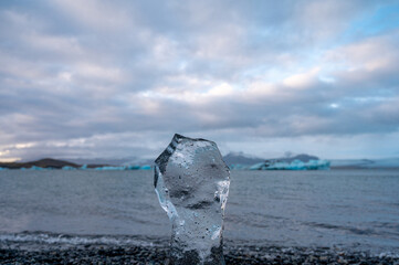 Close-up of piece of ice near glacier lake in Iceland. Jokulsarlon. Wild nature.