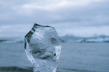 Close-up of piece of ice near glacier lake in Iceland. Jokulsarlon. Wild nature.