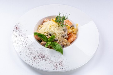 Pasta with Mushrooms, Salmon, Parmesan, and Creamy Sauce