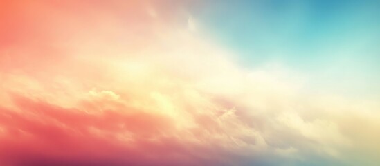Obraz premium A serene gradient sky blending soft hues of orange, pink, and blue, evoking tranquility.