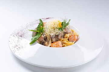 Pasta with Mushrooms, Salmon, Parmesan, and Creamy Sauce