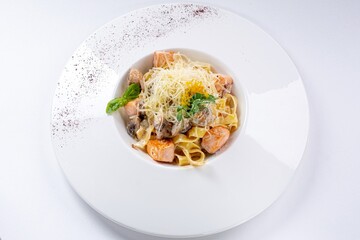 Pasta with Mushrooms, Salmon, Parmesan, and Creamy Sauce