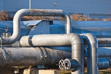 pipelines and pipeline valve close-up on gray background