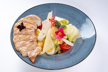Juicy Pan-Asian Salad with Chicken Breast, Vegetables, Parmesan, and Flower Garnish
