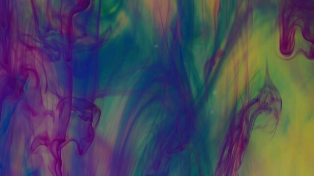 Abstract background. Colored streaks create structures under the influence of water.
