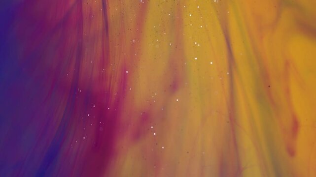 Abstract background. Colored streaks create structures under the influence of water.