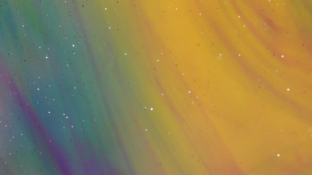 Abstract background. Colored streaks create structures under the influence of water.