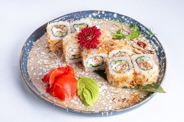 Elegant Japanese Sushi Rolls with Tuna, Ginger, and Wasabi