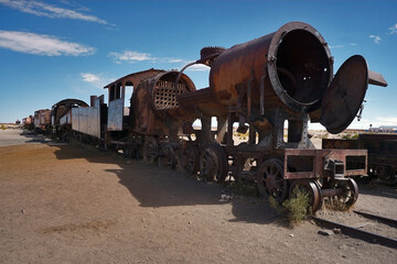 Silent Locomotives in a Vast Salt Desert - Uyuni Salt Flat, Bolivia