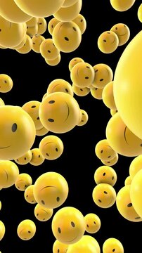 Yellow Smiley Face Balls Falling in Slow Motion