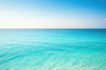 Fototapeta premium Serene Ocean Vista A Captivating Panorama of Azure Waters Under a Clear Sky