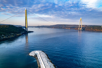 Obraz premium Yavuz Sultan Selim Bridge in Istanbul, Turkey. 3rd bridge of Istanbul Bosphorus with blue sky. Drone shot..