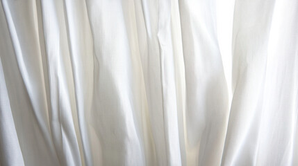 Obraz premium Soft, flowing white fabric drapes elegantly in gentle light creating a serene and calming atmosphere in a minimalistic setting