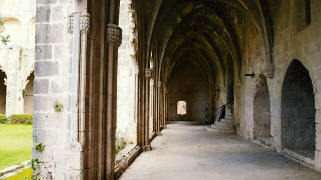 Slow motion walk through the famous arched ruins of Bellapais monastery.