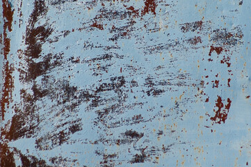 blue background, in the photo an old rusty sheet of metal painted with blue paint
