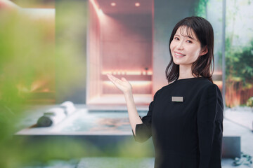 Fototapeta premium スパで働く若い女性