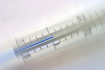Manipulated version of 715 - Close-up view of a thermometer with blue temperature indicator