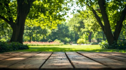 Empty Wood Table Top with Blurred Green Tree in Park