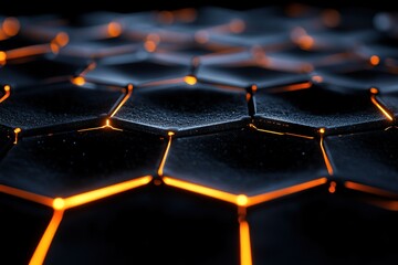 Obraz premium A close up of a black and orange hexagonal pattern