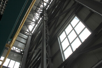 Workers perform welding work at height during the installation of a new plant. Safety regulations not followed