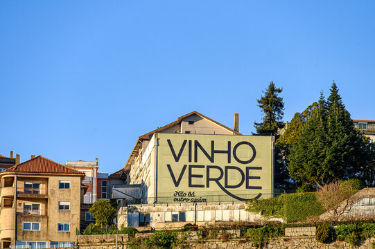 Porto, Portugal, A building with commercial sign of Vinho Verde