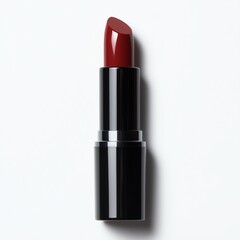 Obraz premium A bold red lipstick on a clean surface, perfect for showcasing beauty products. Ideal for makeup tutorials, beauty blogs, and cosmetic advertisements.
