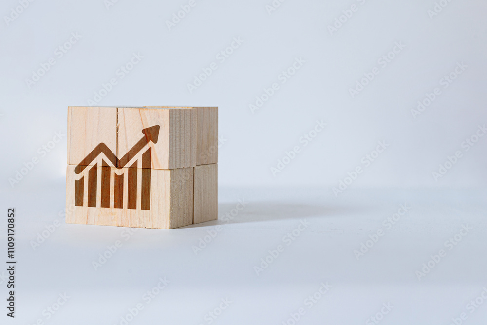Poster a graphical representation of growth and success using stacked wooden blocks with an arrow indicatin