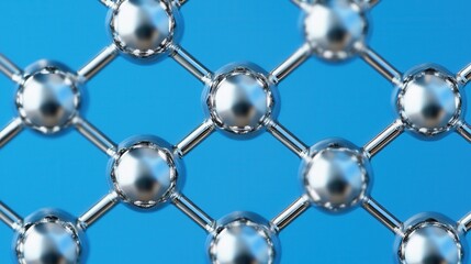 Material science and strength, A close-up view of a metallic lattice structure against a blue background, showcasing an intricate arrangement of spherical nodes and connecting lines.