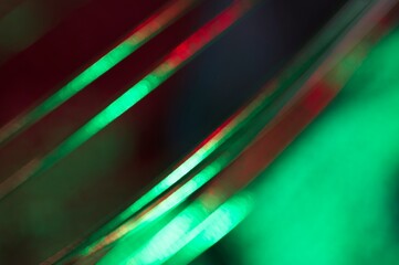 Abstract image with glowing tubes of red and green light