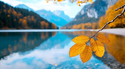 Obraz premium Autumn Tranquility, a peaceful lakeside scene with vibrant leaves reflecting on still water, evoking a sense of calm and nature's beauty.