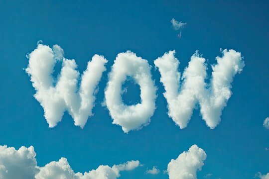 "WOW" letters made out of clouds on a bright blue sky. Background, wallpaper
