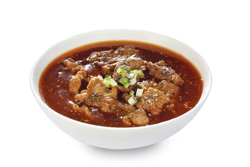 LAMB BLACK PEPPER SAUCE IN WHITE BOWL © Tarun
