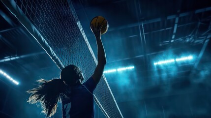 Female volleyball player leaping to spike the ball during a match.