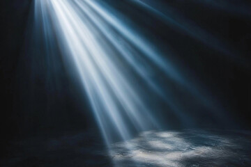 Light beams illuminating a dark space with a soft glow