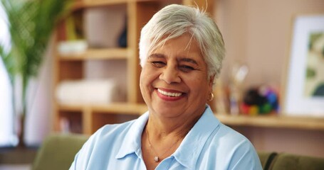 Happy, face and senior woman on sofa with confidence, wisdom and retirement wellness in home. Relax, pride and portrait of elderly person on couch with smile, health and calm morning in living room