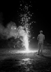 Fireworks being enjoyed by people during Diwali festival