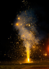 Fireworks being enjoyed by people during Diwali festival