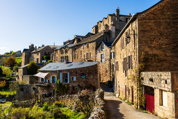 Façade of houses in the medieval village of Castelnau-Pégayrols, former capital of Lévézou,...